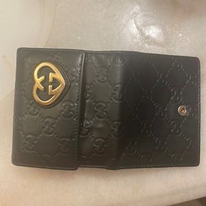 Authentic Gucci wallet color black, preloved still in good condition.